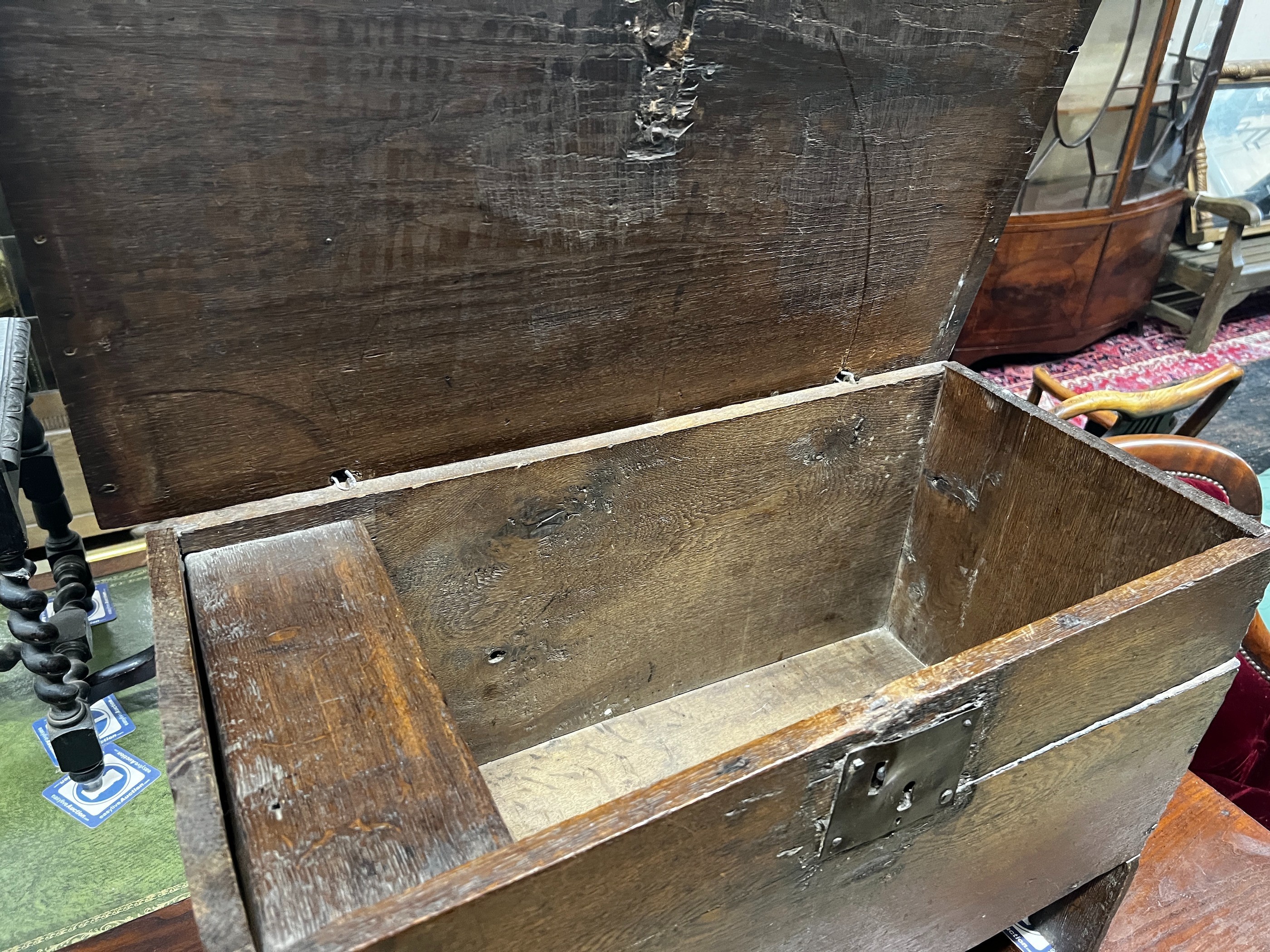 A late 17th century oak six plank coffer, length 73cm, depth 35cm, height 50cm